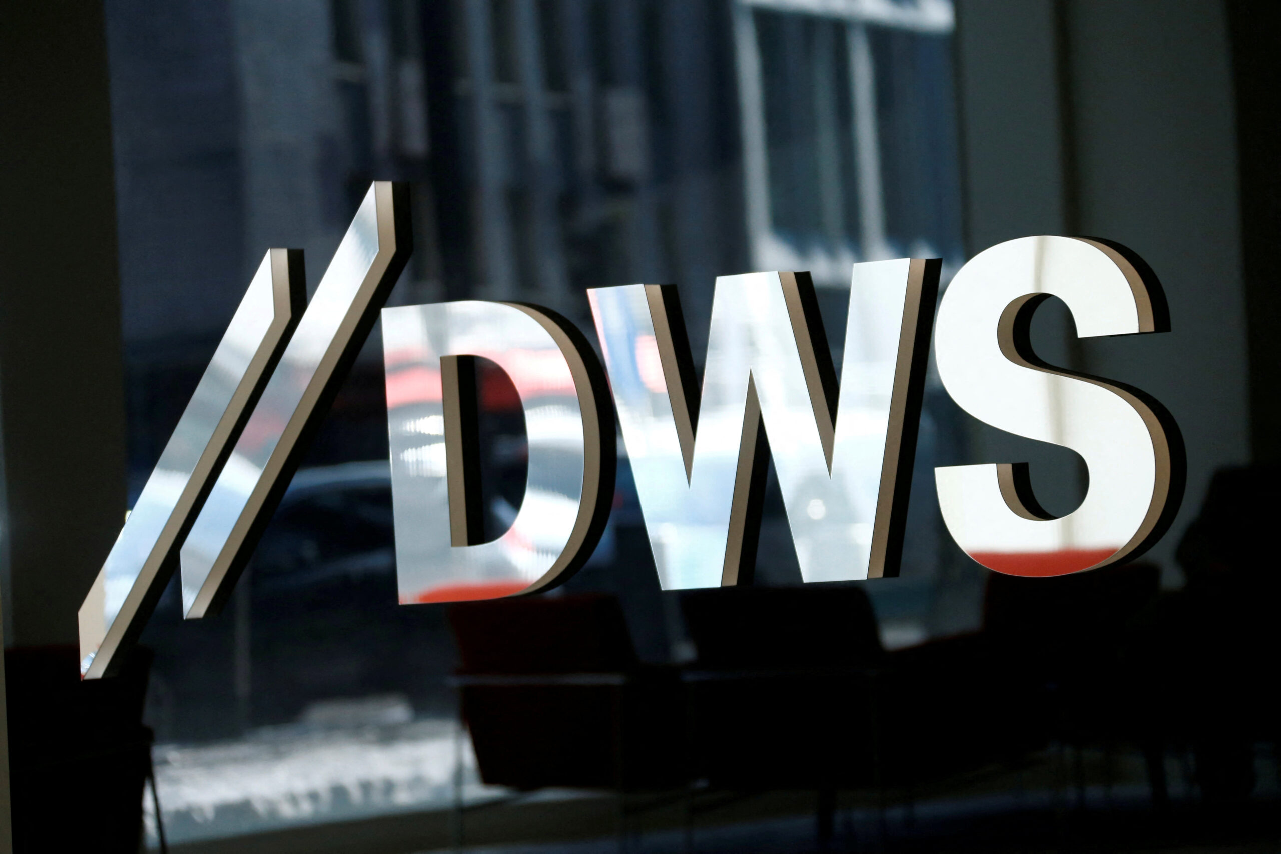 FILE PHOTO: The logo of Deutsche Bank's DWS Asset Management FILE PHOTO: The logo of Deutsche Bank's DWS Asset Management